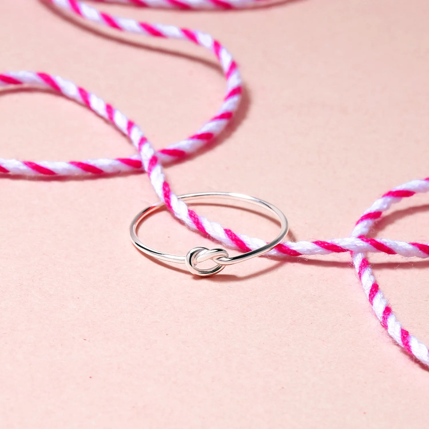 Minimalist Silver Ring: Stackable Infinity Love Knot Sterling Band